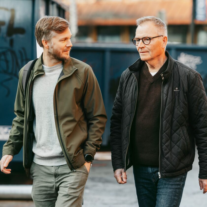 Nordlo two men walking outside